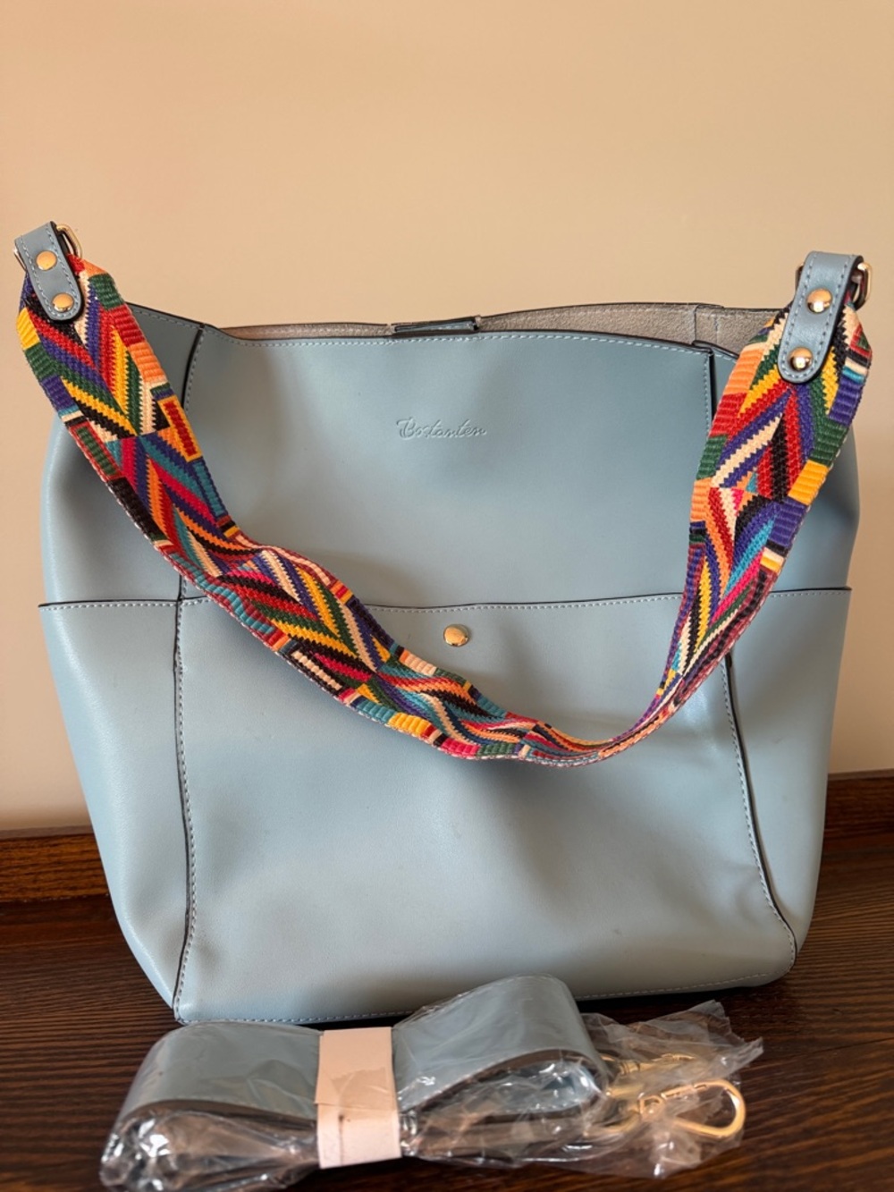 Light Blue Leather Shoulder Bag with Colorful Geometric and Solid Matching Strap